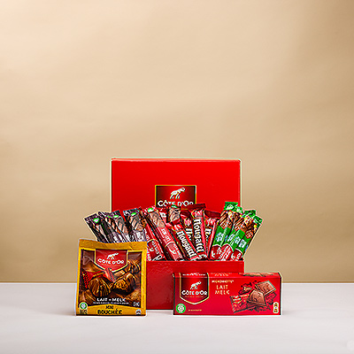 Your favorite chocoholic won't believe his eyes when he opens this fan-tas-tic gift box filled with heavenly Côte d'Or chocolate treats.