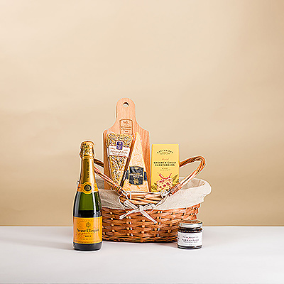 Raise a toast to holidays and festive occasions with the winning combination of French Champagne and Dutch cheese presented in a beautiful woven basket.