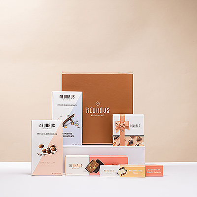 Surprenez quelqu'un de spécial avec ce coffret cadeau en bronze rempli de chocolat belge de haute qualité du maître chocolatier Neuhaus. Ce cadeau au chocolat belge contient un large éventail de friandises pour satisfaire tous les goûts.