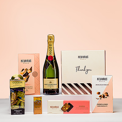 No hay mejor manera de decir «Gracias» que con una hermosa colección de bombones belgas de Neuhaus y Godiva maridados con el festivo champán Moët & Chandon. Es la expresión perfecta de su gratitud a amigos, familiares o socios comerciales.