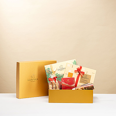 Send warm holiday greetings and wish them Merry Christmas with a golden gift box full of the best Godiva chocolate.