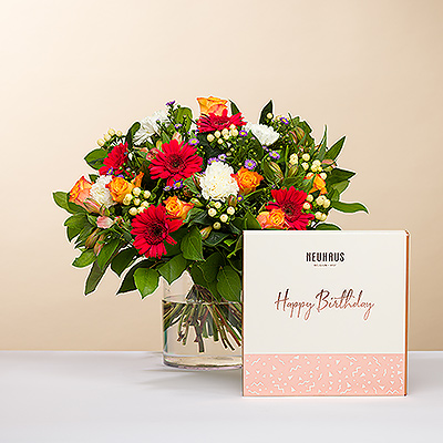 Dieses exquisite Blumengeschenk mit unserem Blumenstrauß des Tages und einer Neuhaus Happy Birthday Geschenkbox aus belgischer Schokolade ist die beste Art, jemandem alles Gute zum Geburtstag zu wünschen.