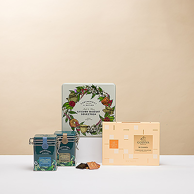 Unwind with friends over a fine cup of British tea with luxury biscuits and Godiva Belgian chocolates in this Cartwright & Butler Tea Selection gift set.