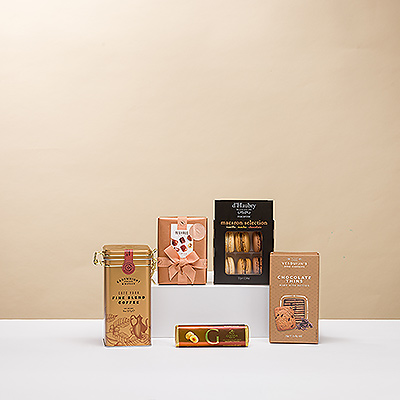 Delight your favorite coffee lover with this very special gourmet coffee and sweets gift. It has the perfect combination of fine coffee, sweets, and Belgian chocolates to elevate an afternoon coffee break into a memorable occasion.