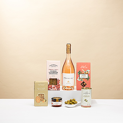 Enjoy the pleasures of a fine rosé wine from sunny Provence with a delicious collection of European gourmet snacks in this elegant gift.