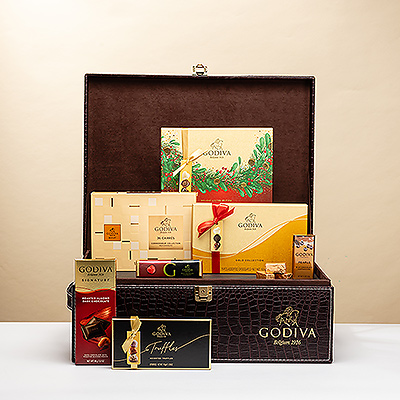 Perfect for life's most important occasions: a stunning Godiva logo croco gift hamper with a scrumptious collection of luxurious Godiva chocolates. This impressive VIP gift is the sweetest way to celebrate Christmas, New Year's, and grand business successes.