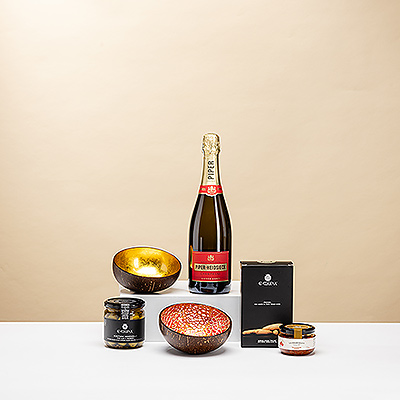 Pop open a festive bottle of Piper-Heidsieck Champagne to enjoy with friends for an elegant apero! The stylish bubbly is presented with equally stylish handmade serving bowls and savory snacks in this apero gift set.