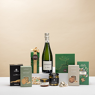 Estas Navidades, obsequie a sus amigos, familiares y colegas con un regalo elegante y con estilo. Una hermosa botella de champán Léon & Lucien se combina con una deliciosa colección de delicias navideñas: chocolates navideños Corné Port-Royal, aperitivos salados, frutos secos crujientes y mucho más.