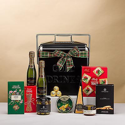 Looking for a stylish, unique gourmet Christmas gift? Look no further than this fantastic assortment of the finest European savory and sweet snacks hand packed into a chic black cooler. A pair of 20 cl bottles of Cava sparkling wine adds a festive holiday touch.