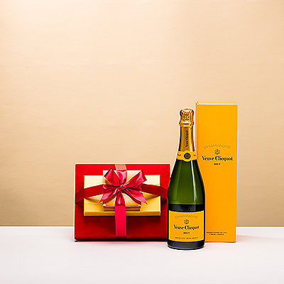 Make an impression with a gift that combines the perfect pairing of bubbly Veuve Clicquot Champagne with an elegant Godiva chocolate gift tower. The three delicious layers of rich Godiva chocolates are all tied up with a gorgeous red bow for the perfect gift.