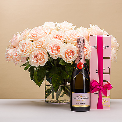 Surprise her with the prettiest gift! This lovely bouquet comprised of 20 light pastel colored roses is presented with a beautiful bottle of sparkling Moët & Chandon Rosé Champagne. The perfect pairing of romantic roses with the pink bubbly is the perfect gift for weddings, anniversaries, her birthday, or any romantic occasion.